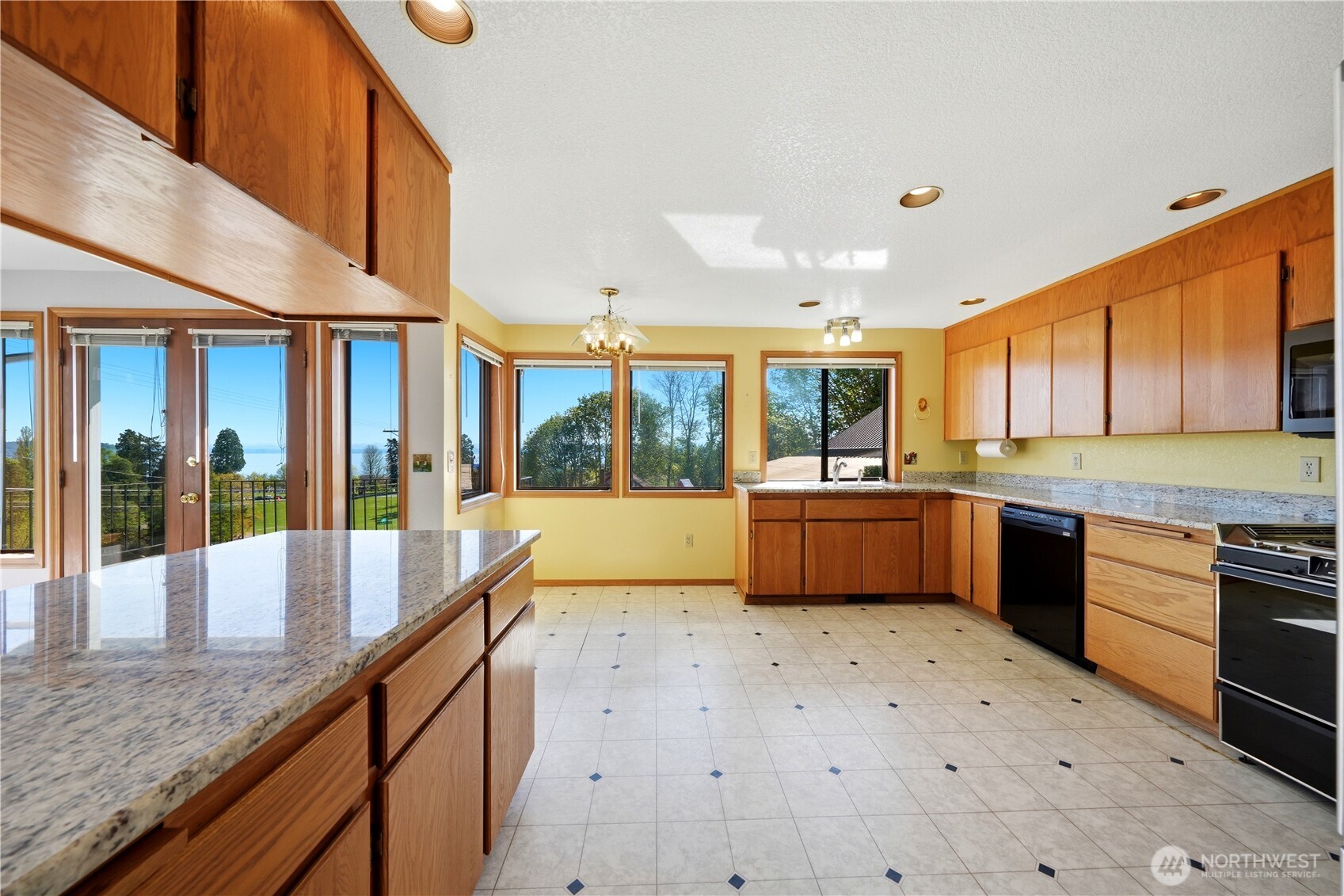 Kitchen has loads of cupboards and counter space.
