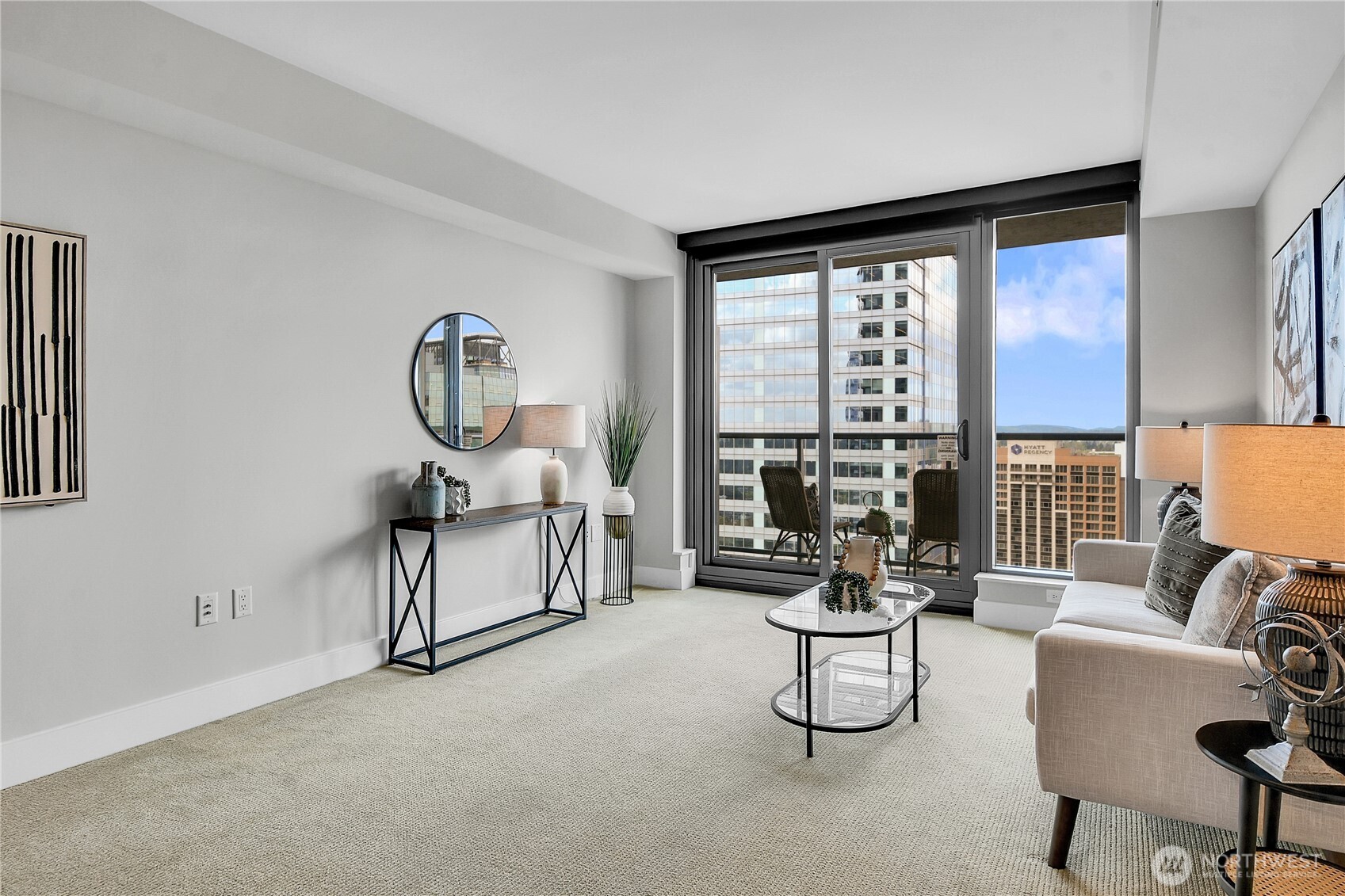 A covered deck that faces north offers panoramic views to the north, east and west of the beautiful city, the Mountain Ranges and Lake Washington!