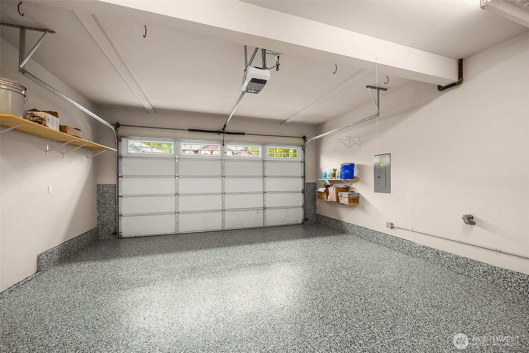The garage has a brand new epoxy flooring.