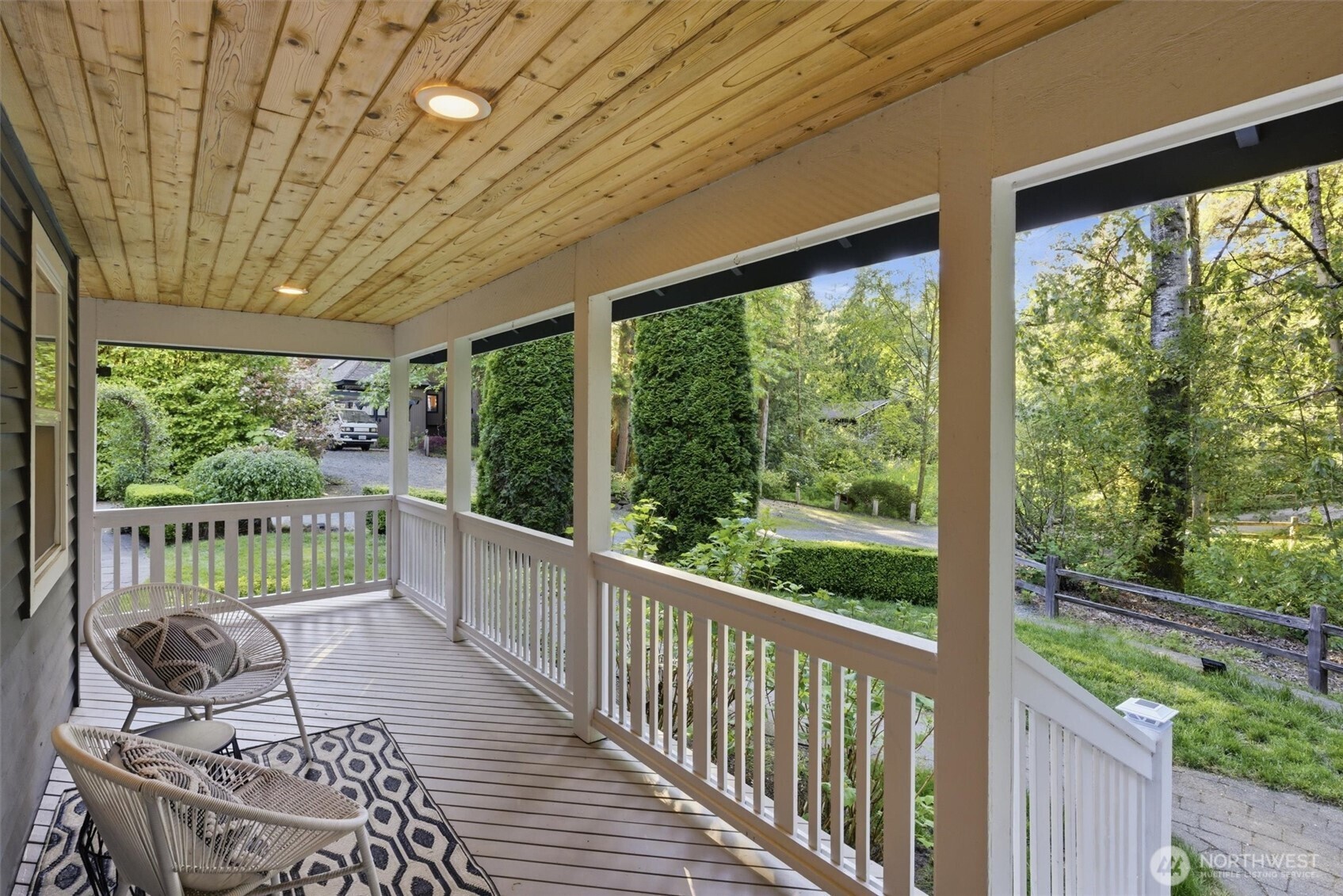 Private creekside estate on nearly ¾ of an acre in the heart of Rose Hill