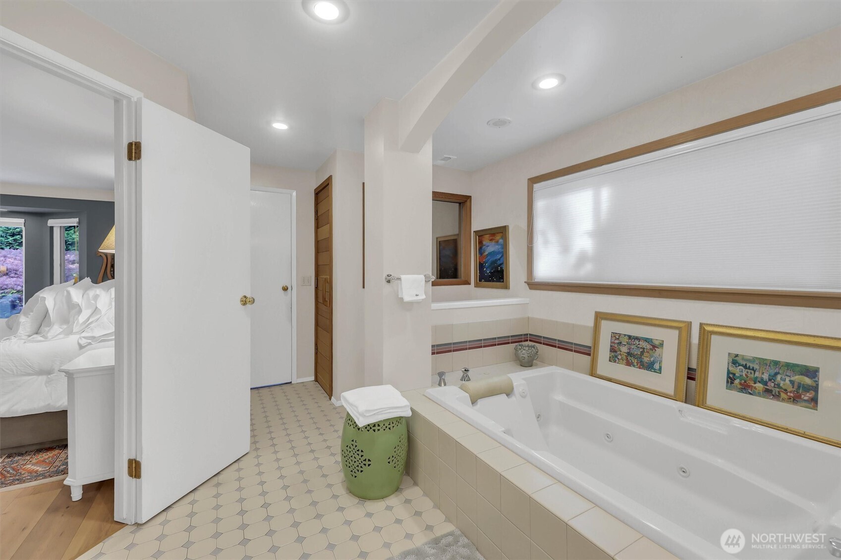Primary bathroom is very large and has an attached walk-in closet.