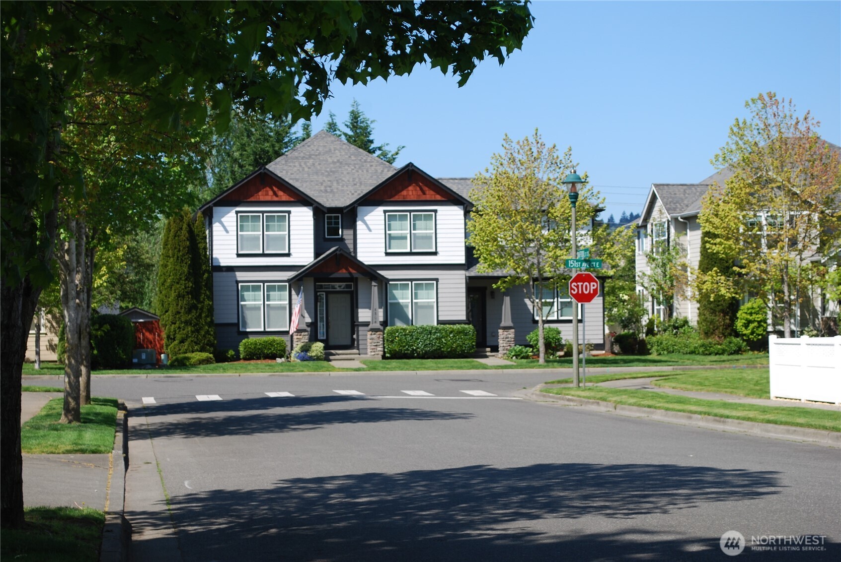 Stunning 2,539 sqft, 4 bedroom, 3 full baths, 3 car tandem garage, Canterwood home with discrete – side of home RV parking, AC, fully fenced backyard, alley access, and craftsman mill work throughout.