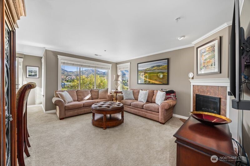 Large windows that view River Walk Waterway & downtown Chelan