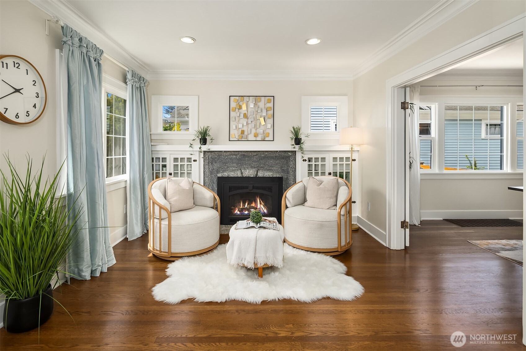 Charming Built in Cabinets and Crown Molding throughout