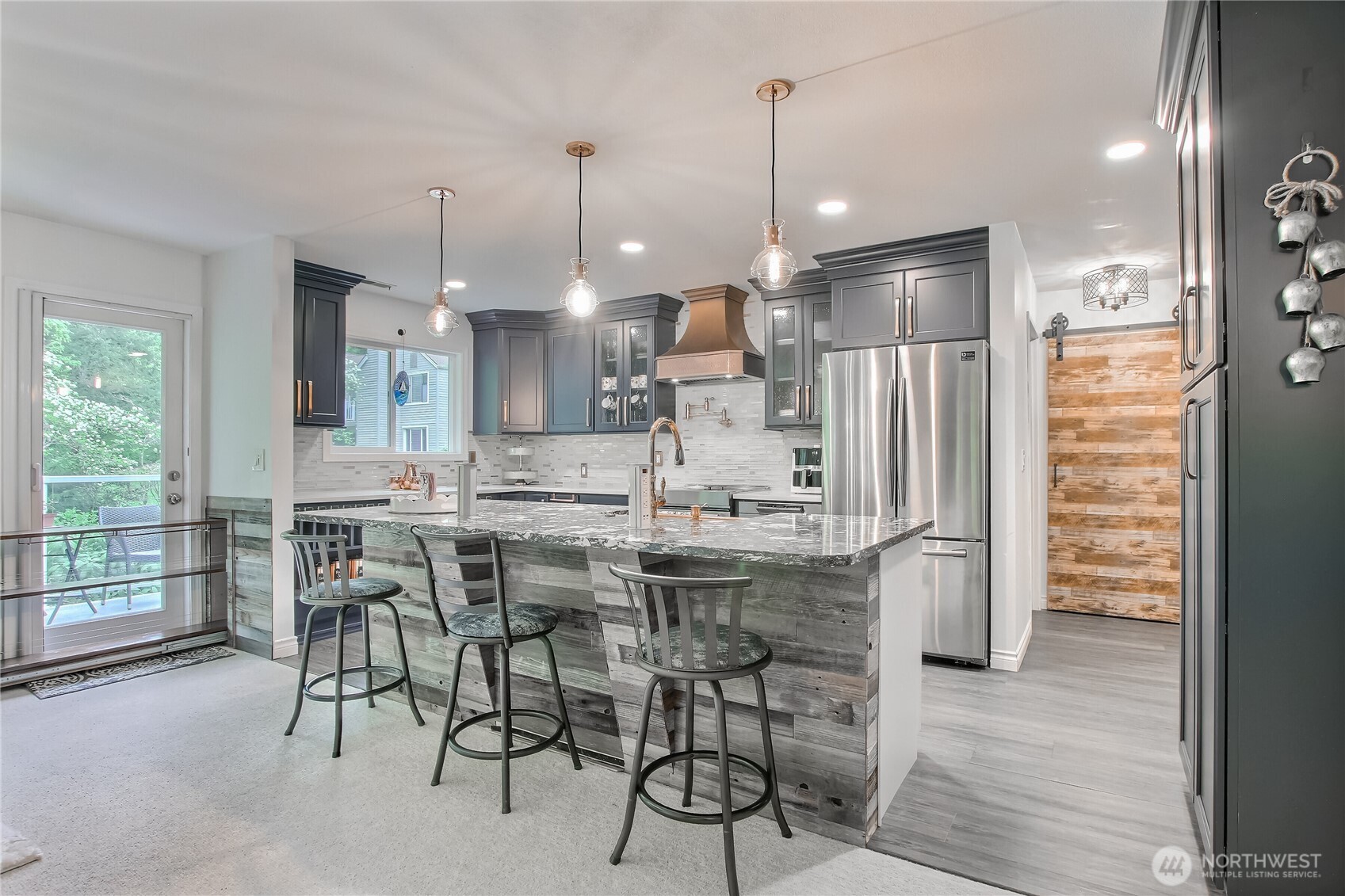 Pendant lighting, pantry cabinet, custom cabinets, granite.