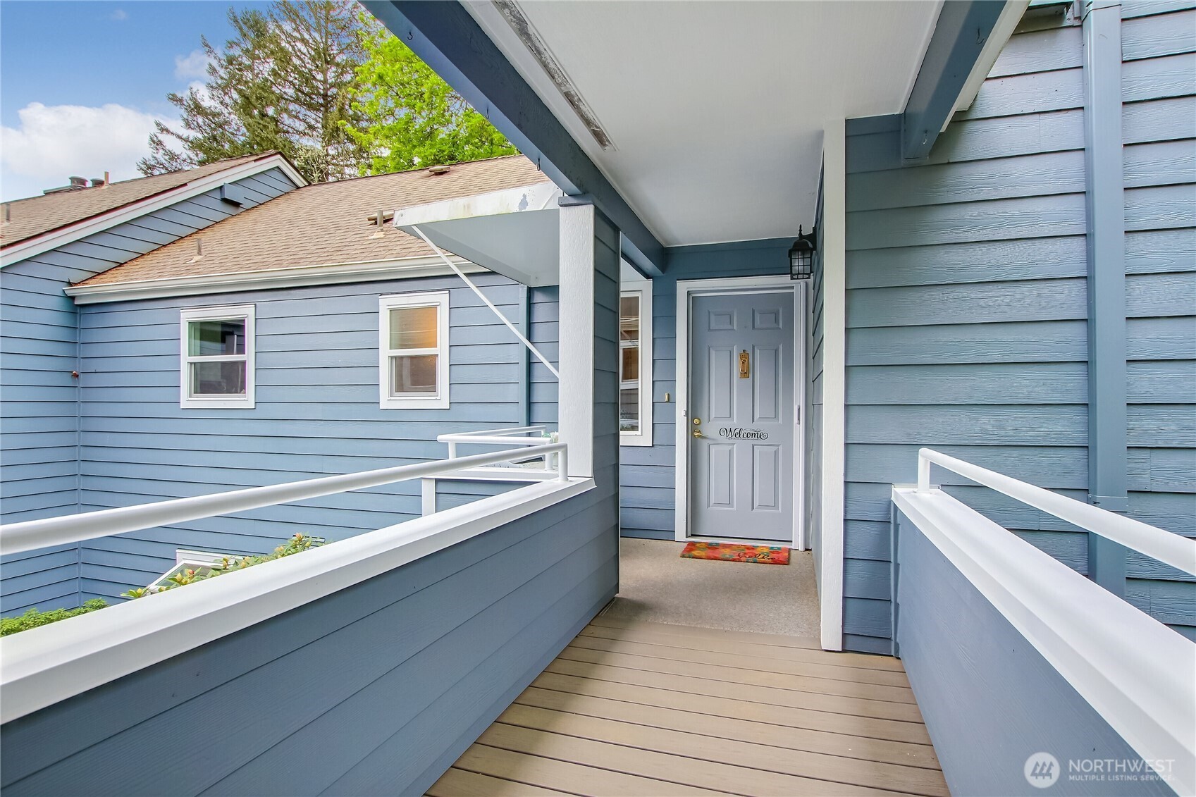 Covered breezeway takes you straight from your garage to your front door.
