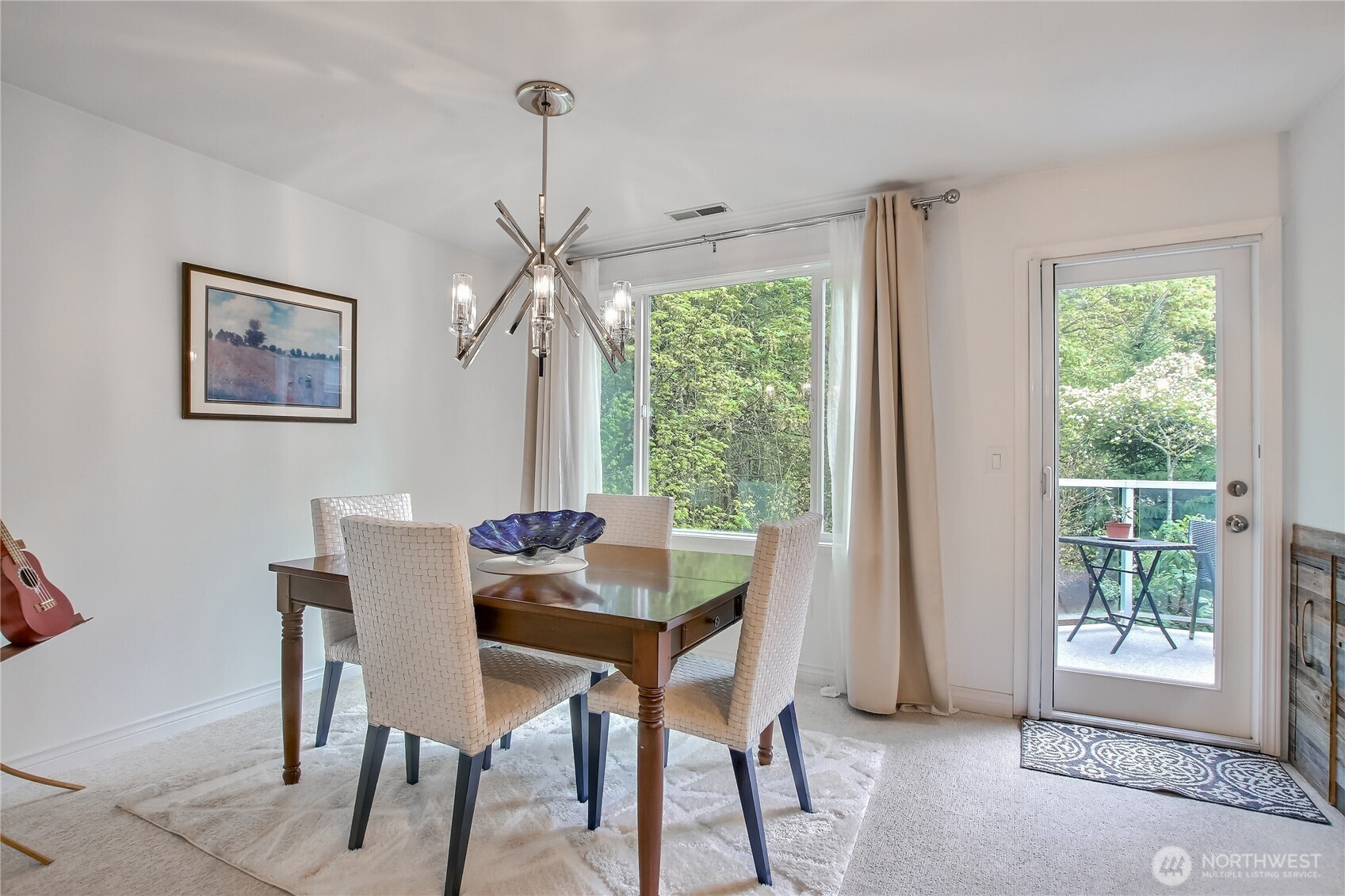 Dining room with wall space for your special pieces and door to your view deck.