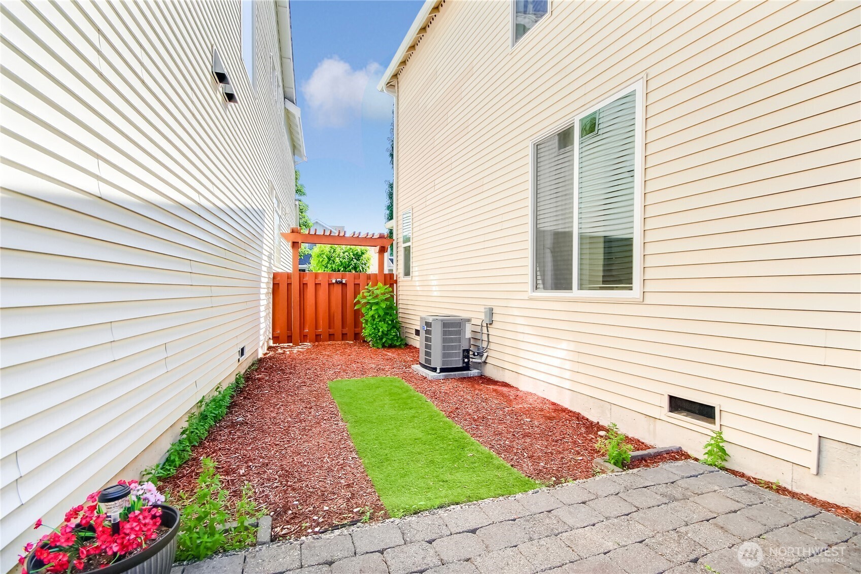 Backyard is very private & low maintenance. Extend the patio, plant with flowers & make an oasis or just enjoy low maintenance