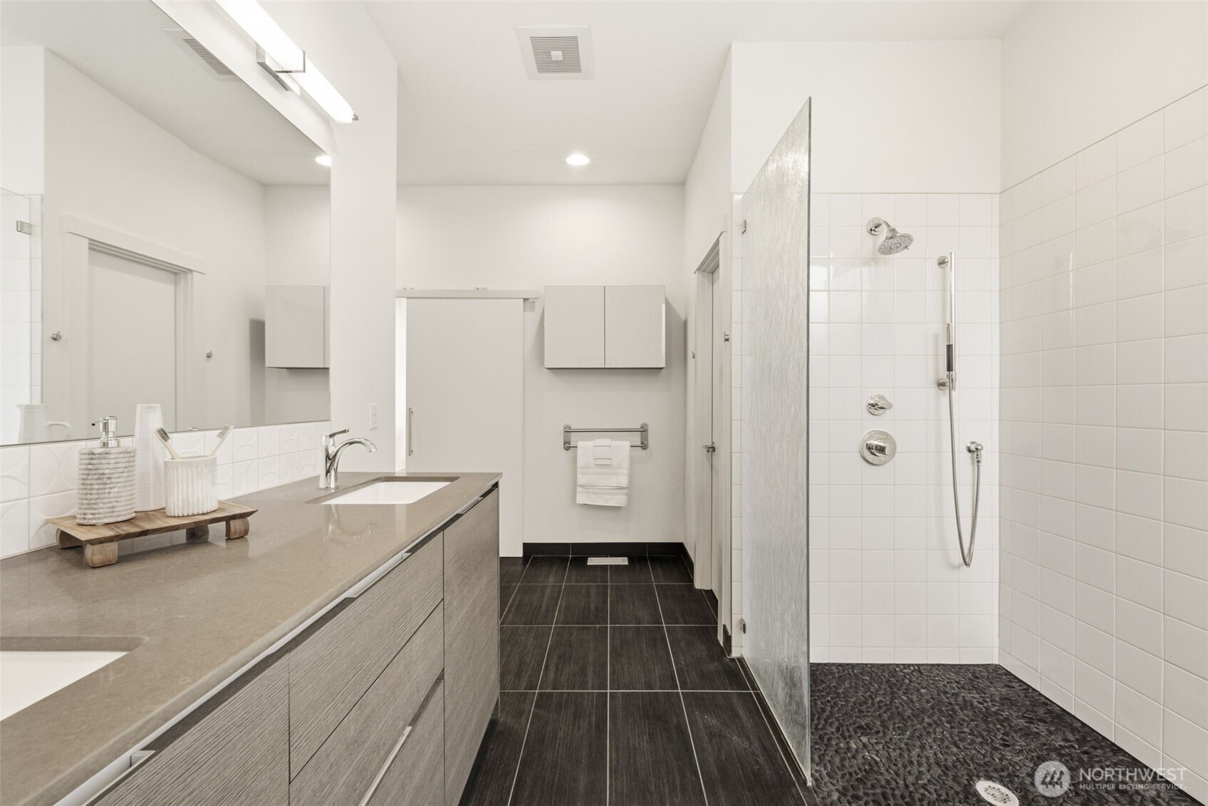 Spa-like primary bath with heated floors