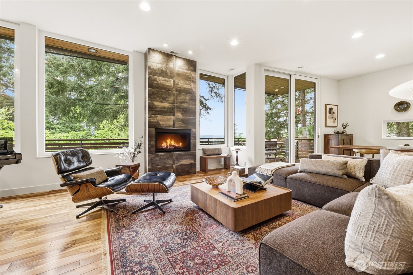 Main living framed by natural light and serene outlooks