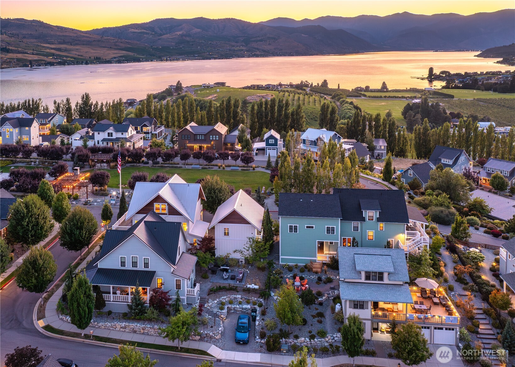 Aerial view of home looking west over Lake Chelan and the Lookout's Hilltop Park.