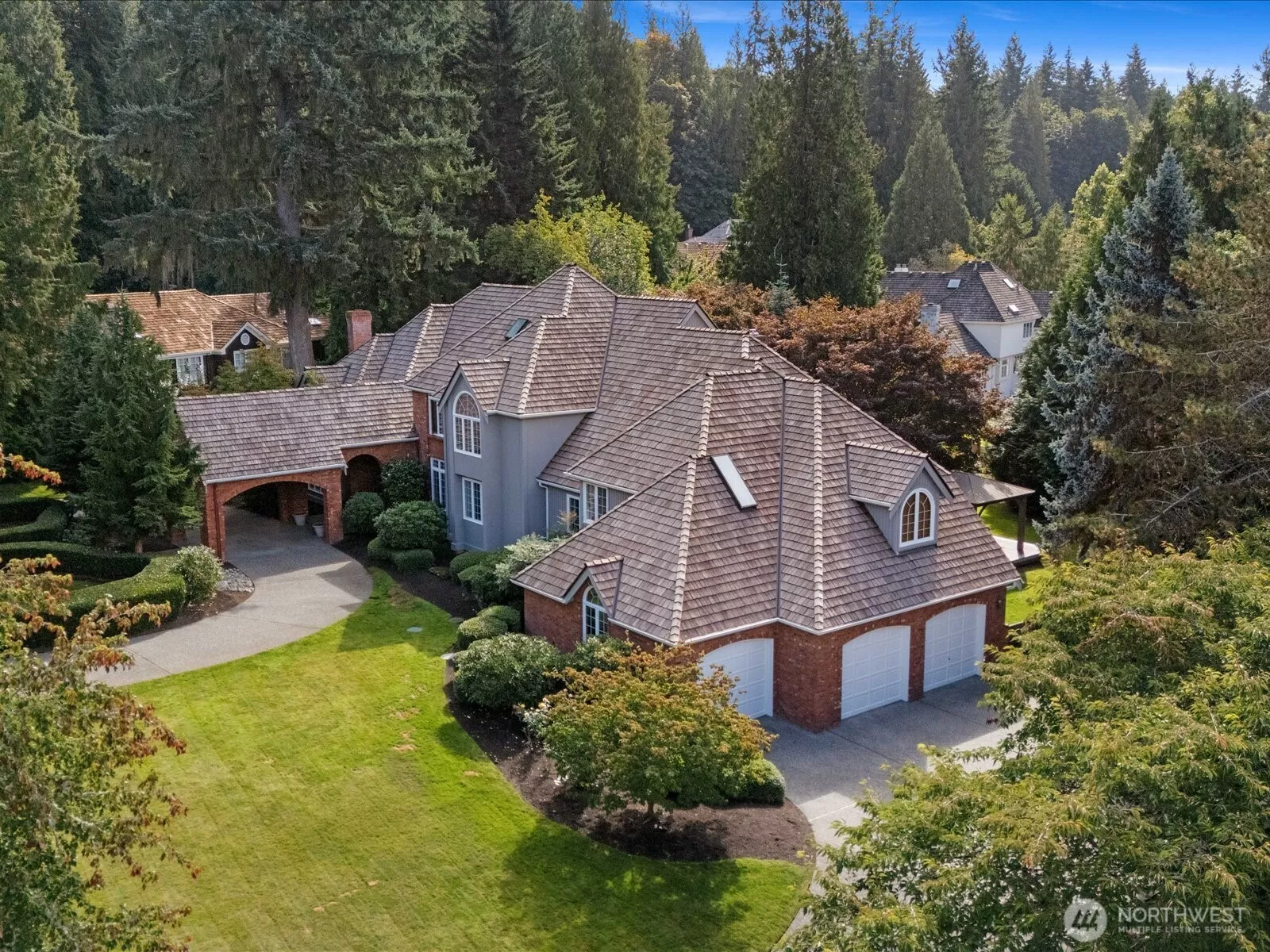 Grand entrance with elegant curb appeal.  Circular driveway to the covered front entryway.