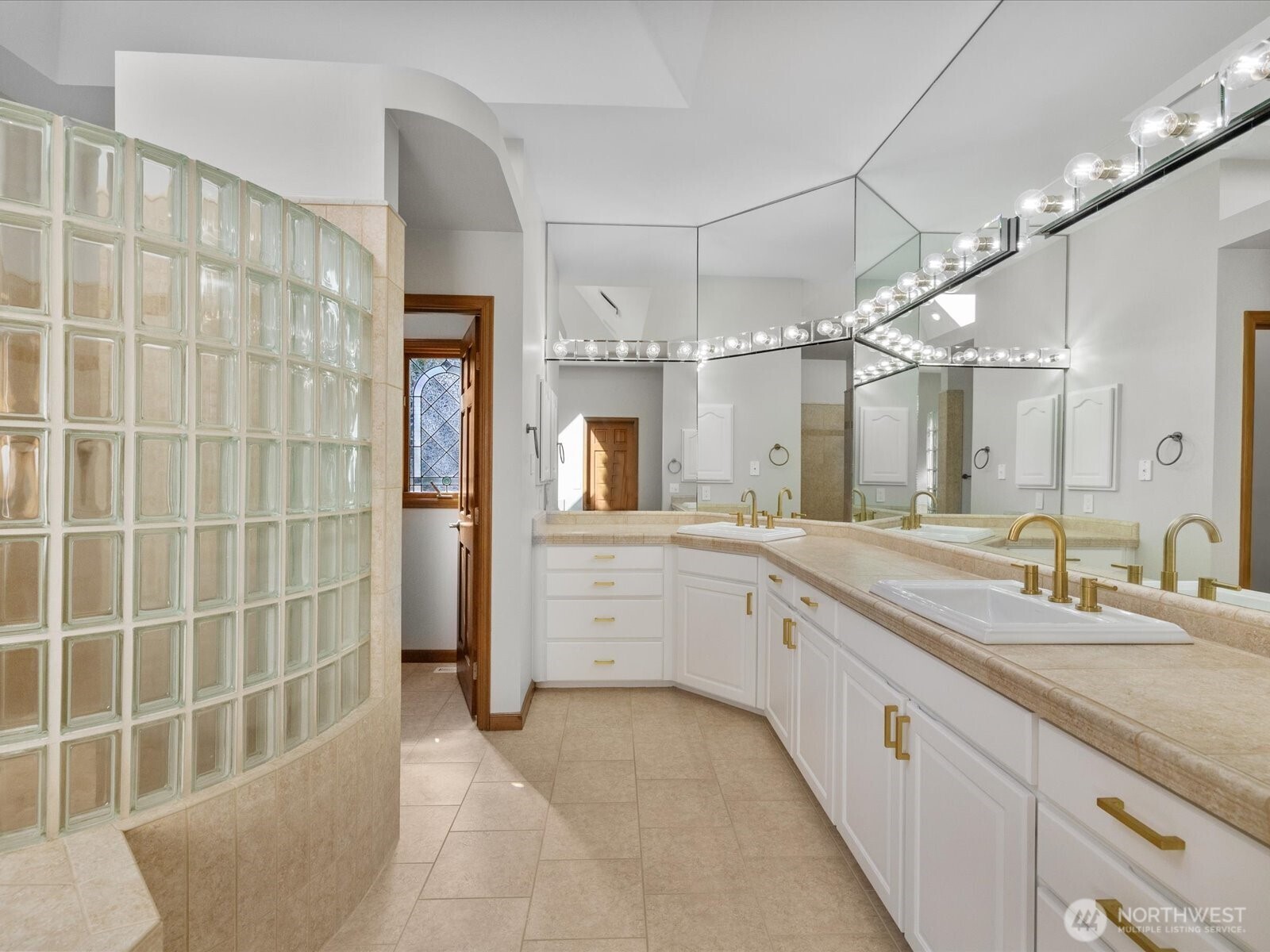 Primary bathroom with new hardware and designer finishes.