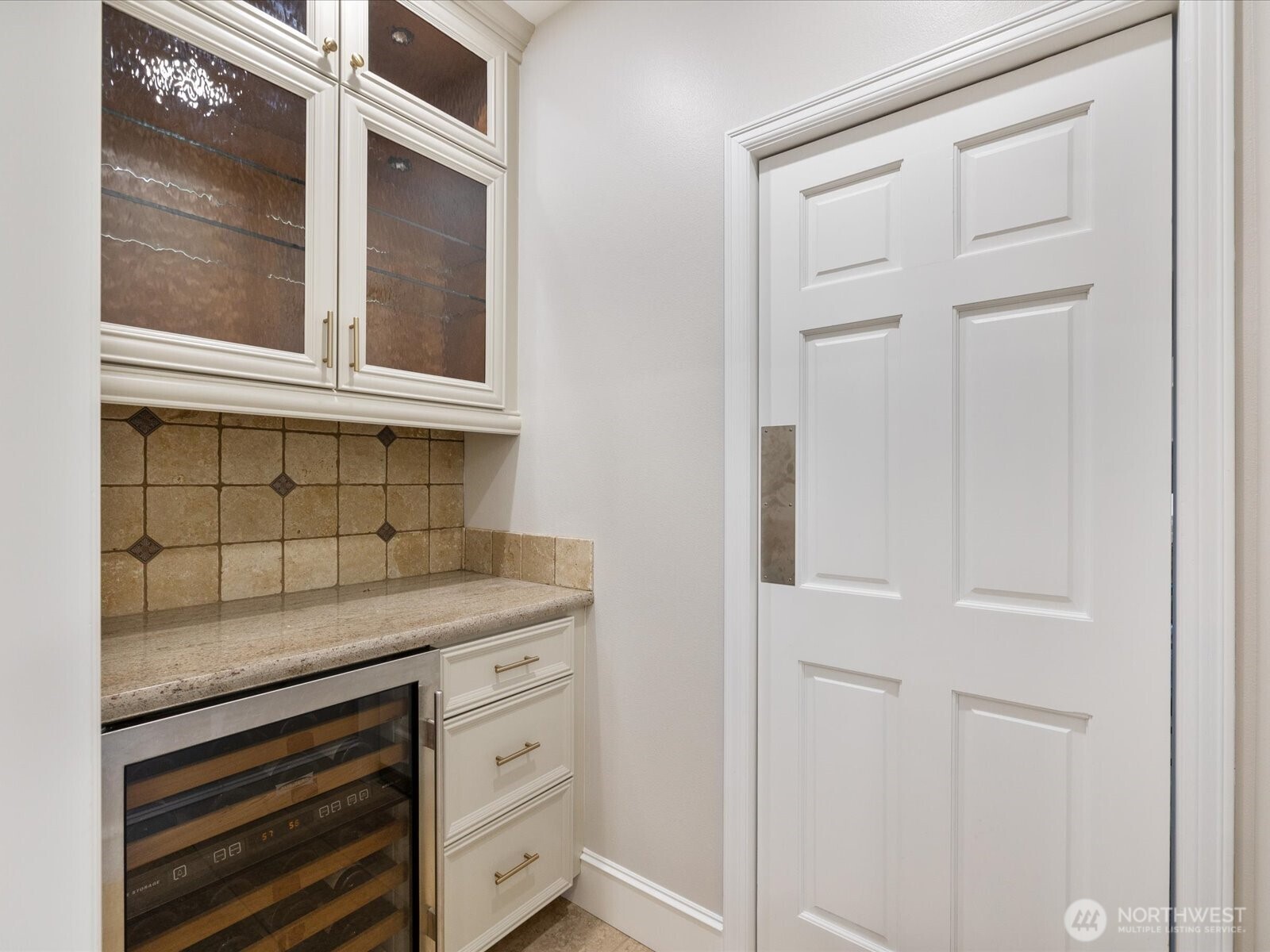 Butler's pantry is in between the kitchen and formal dining room.