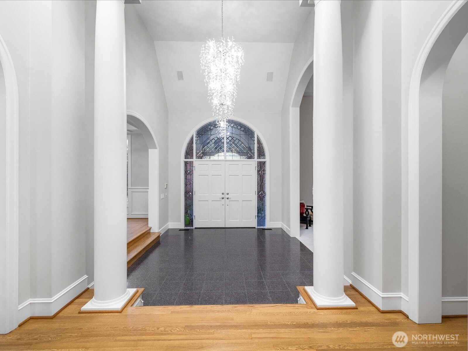 Elegant Foyer -- formal living room to the left, formal dining room to the right, office/den straight a head, and primary on main is to the left of the den.