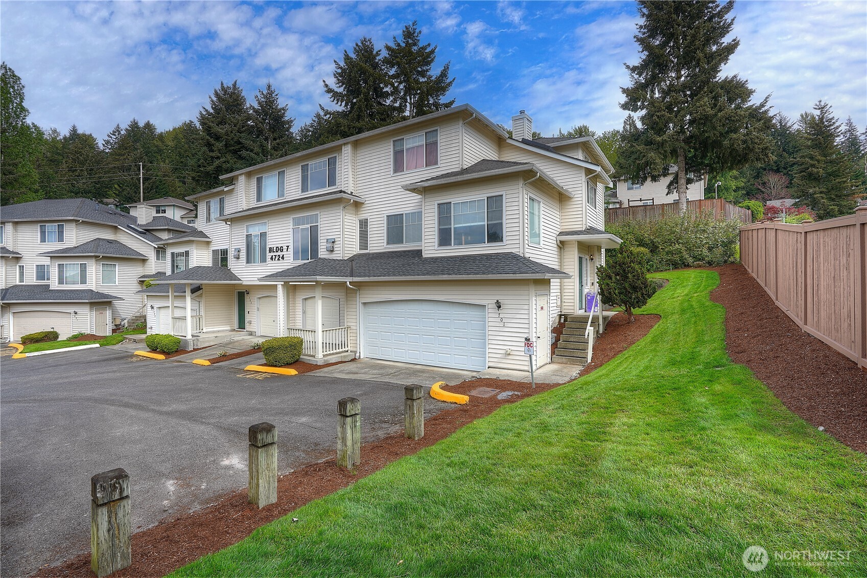 Ideally positioned in the last building at the end, this home offers added privacy and a quieter setting.