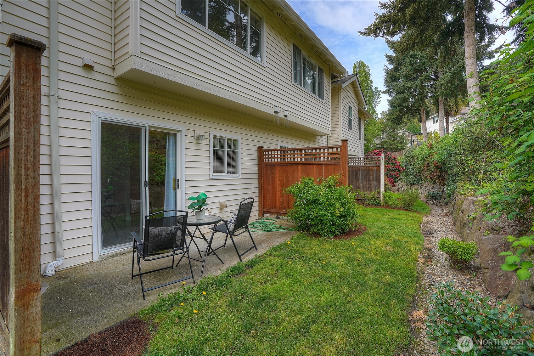 Back patio conveniently located off dining area.