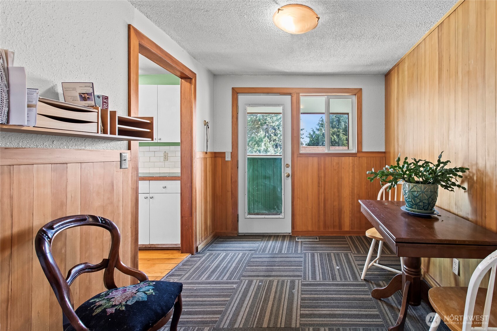 A flex space between the entryway and the backayrd. Perfect for morning coffee