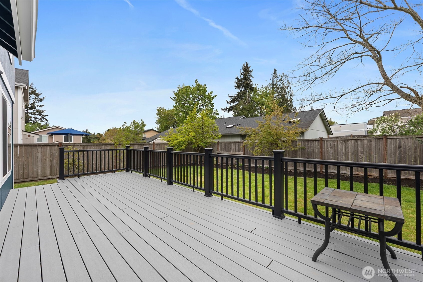 Large back deck for entertaining and relaxing.
