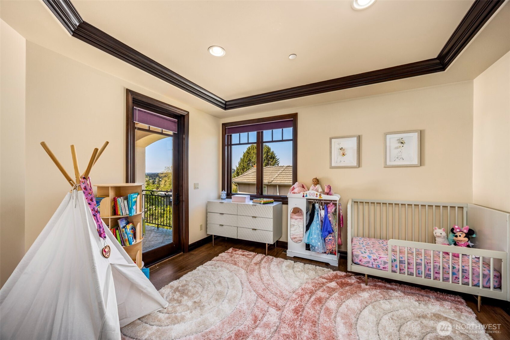 Upper level bedroom 2 with balcony access: Upper-level bedroom with private balcony access and territorial views — every bedroom on this floor enjoys its own outdoor space.