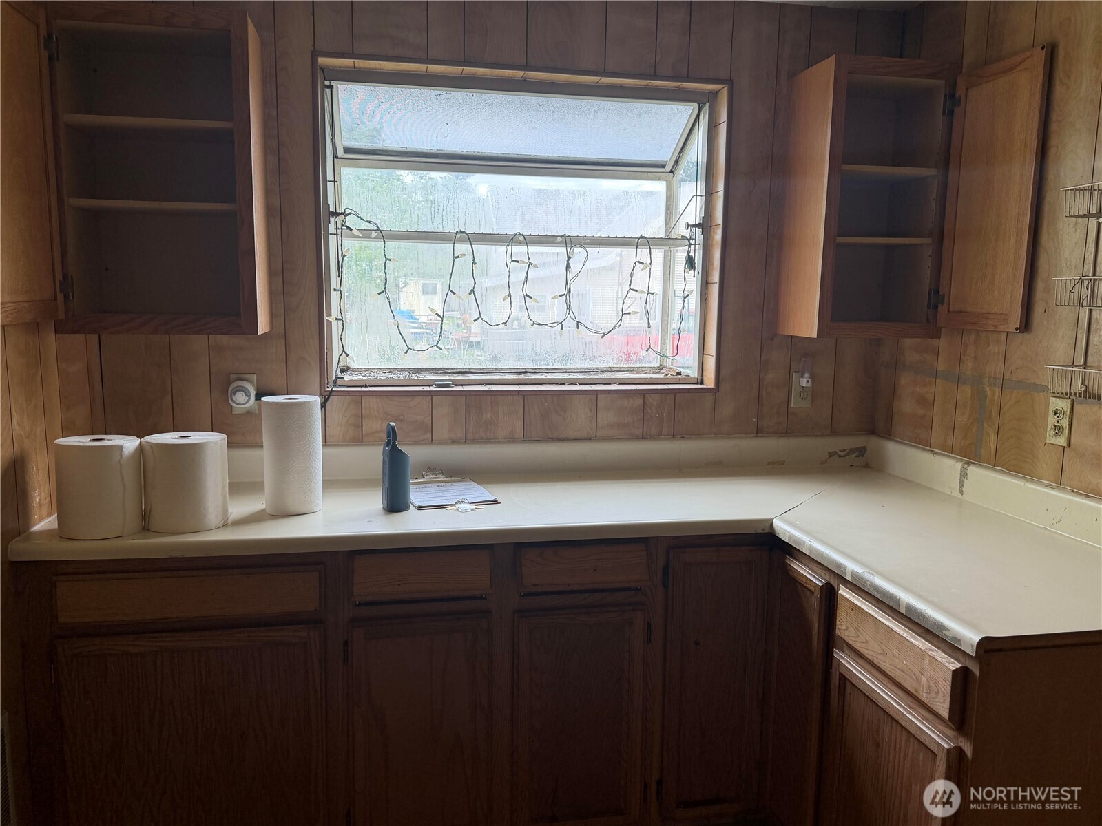 Extra finished space off kitchen for pantry and meal prep.