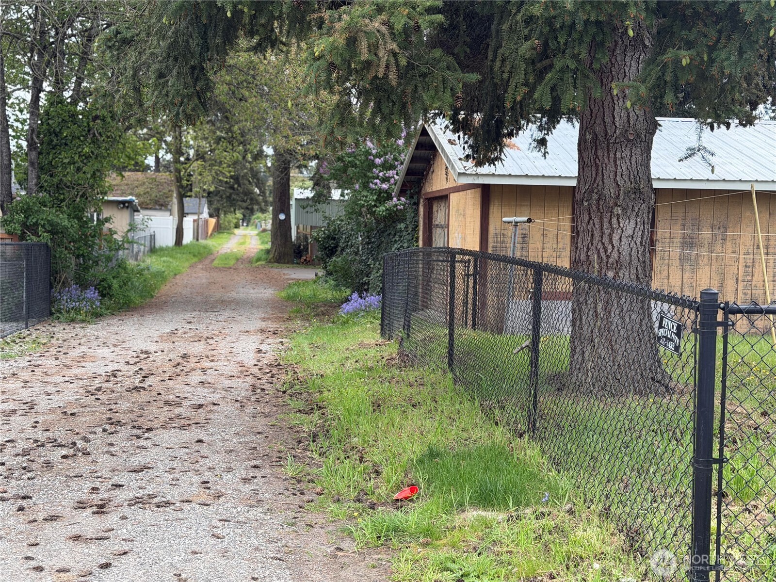 Large alley access to garage / Potential living area.