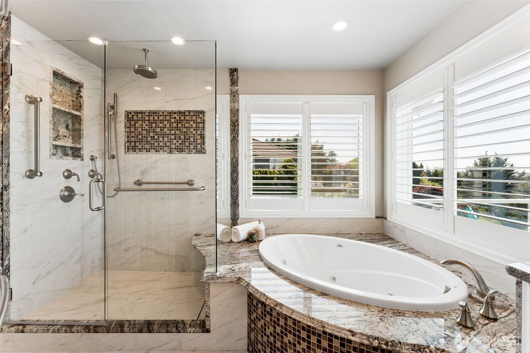 Luxuriously finished with tile, granite, and heated floors