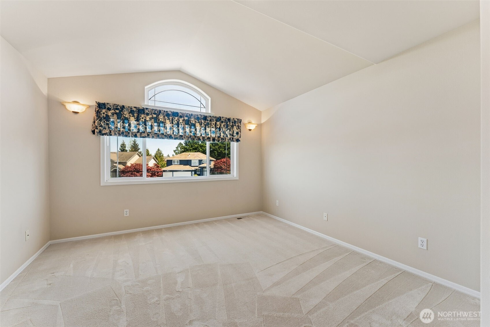 Bedroom 2 with vaulted ceiling