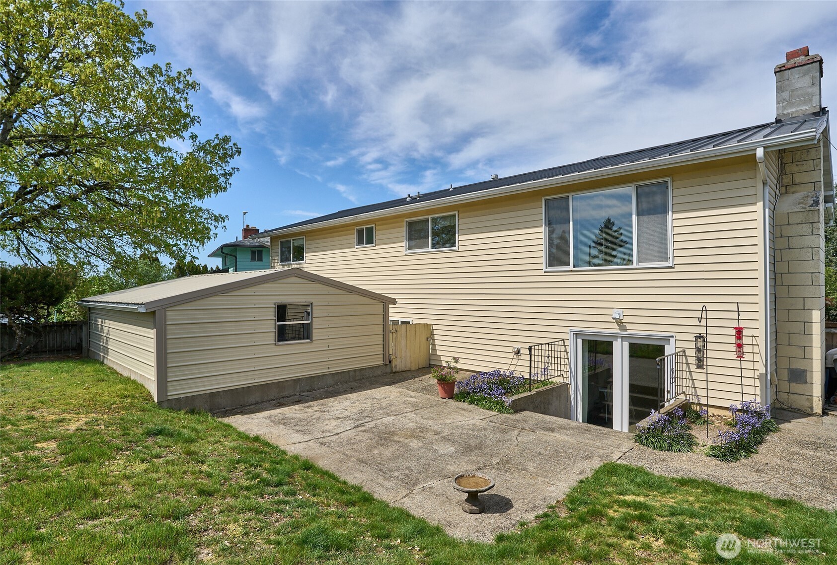 Another View of the Fully Backyard and Two Car Detached Garage.