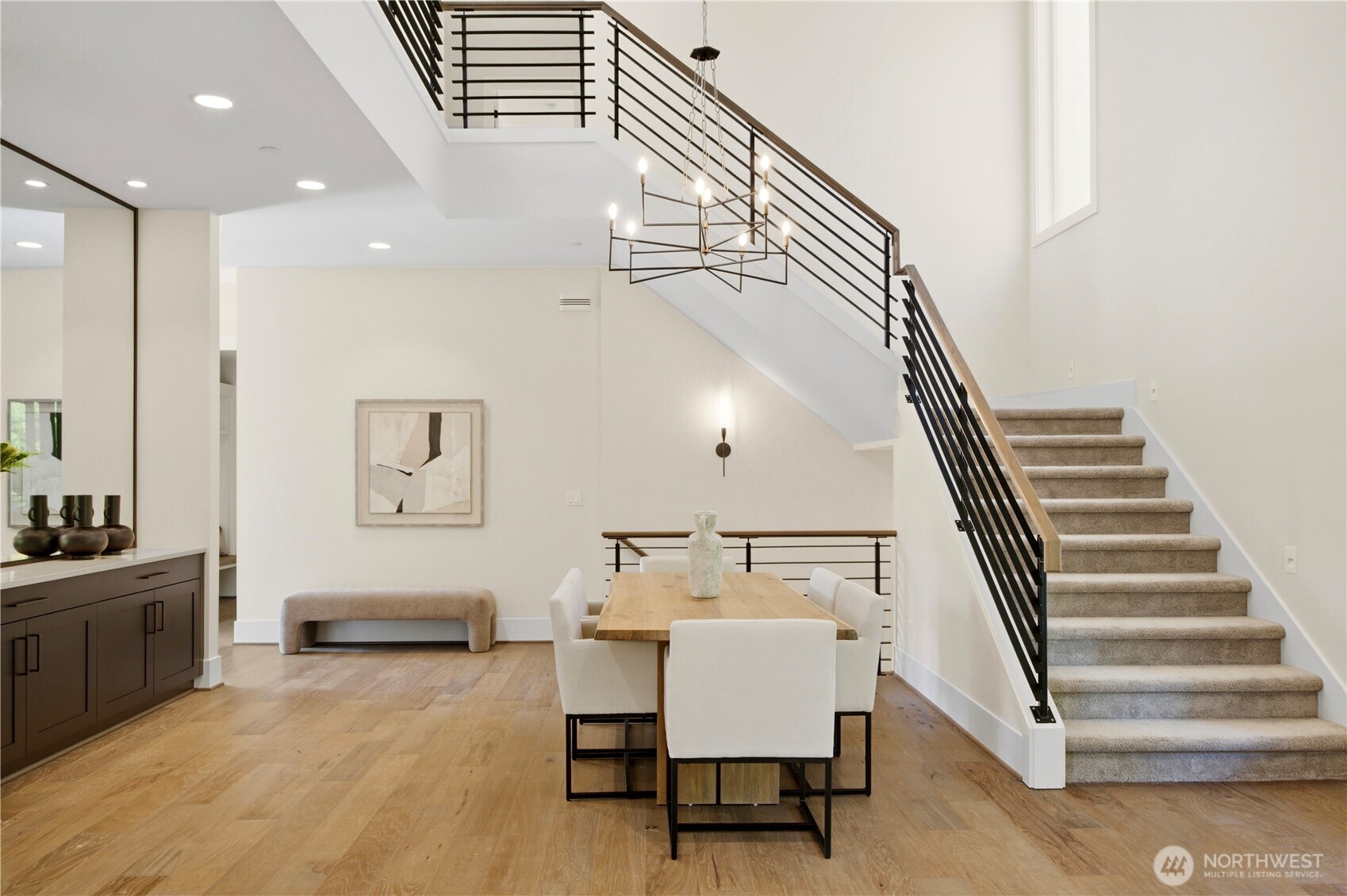 Grand entry with soaring ten-foot ceilings and abundant natural light