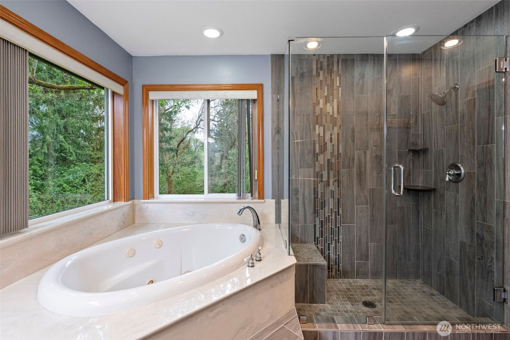 Primary Bathroom with jetted tub and updated shower enclosure