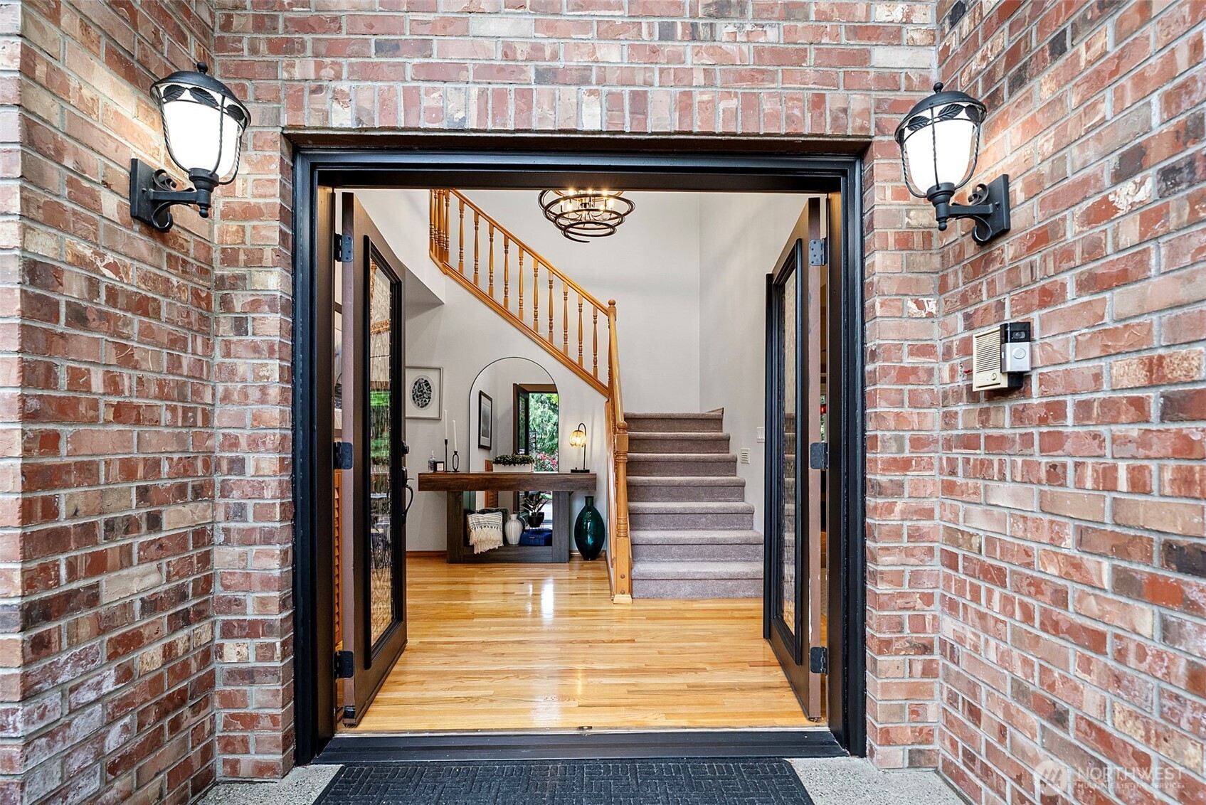 Front entry with double doors and stained glass windows