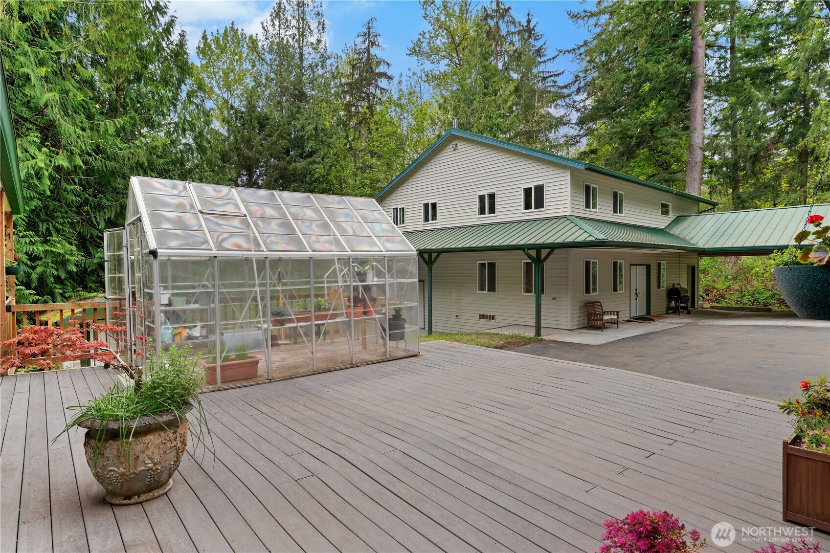 Looking back from the main house to the greenhouse and ADU