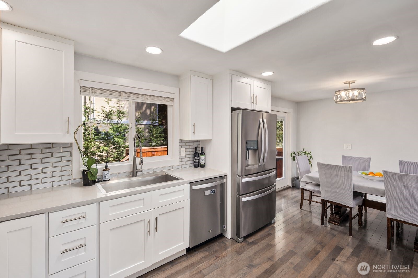 Renovated bathroom with elegant tile surround and refreshed finishes designed for modern everyday comfort