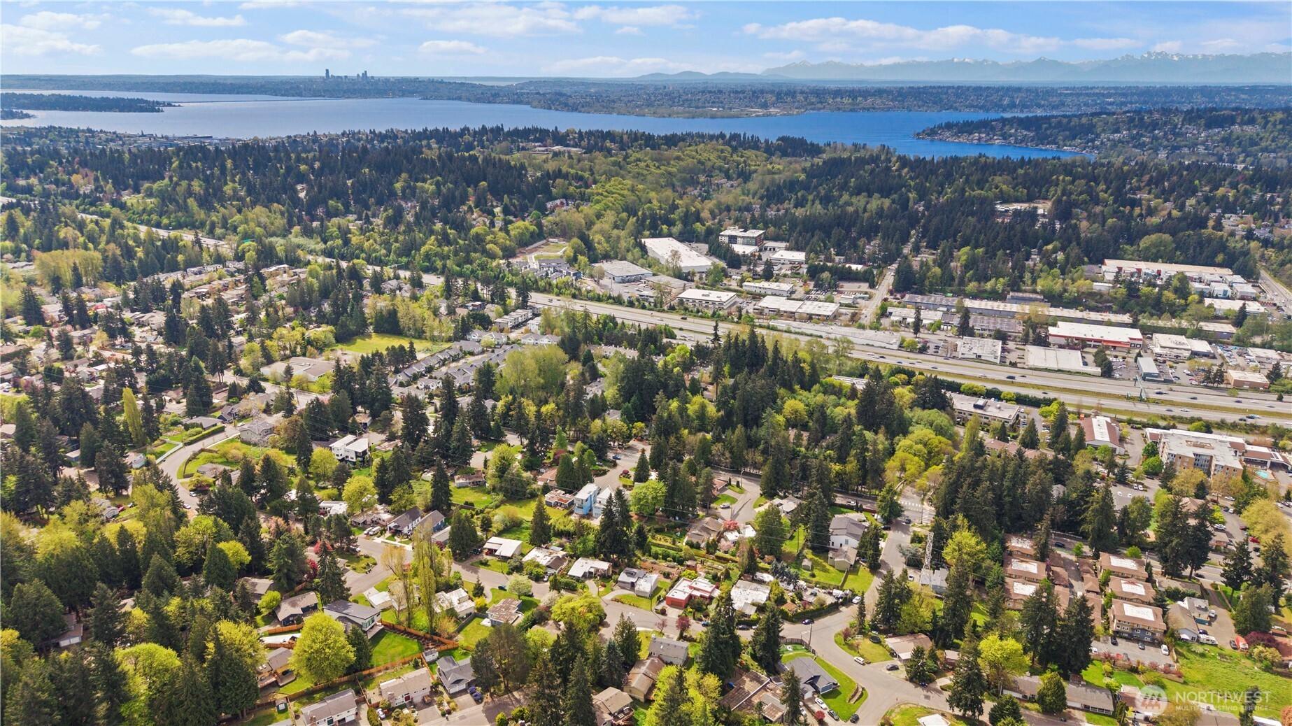 Elevated aerial perspective showcasing the surrounding Rose Hill neighborhood, nearby amenities, and convenient Eastside location