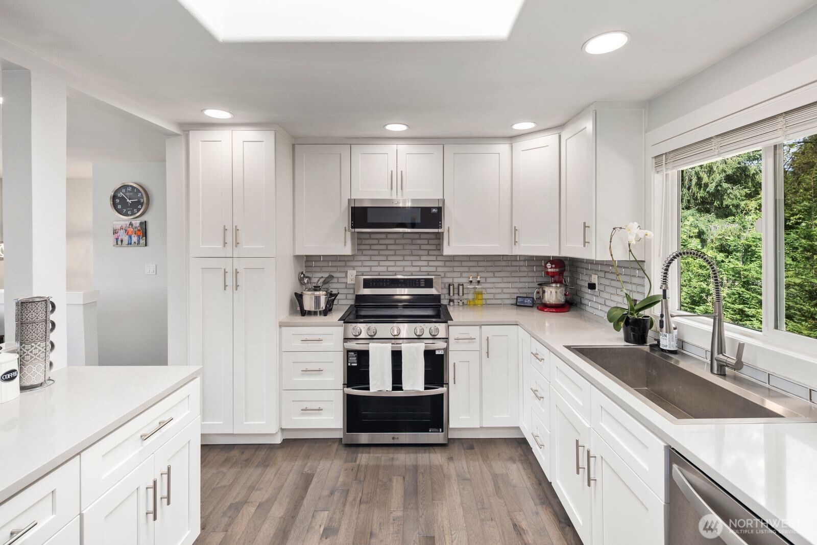 Stylishly updated bathroom with modern finishes, bright lighting, and a clean spa-inspired feel