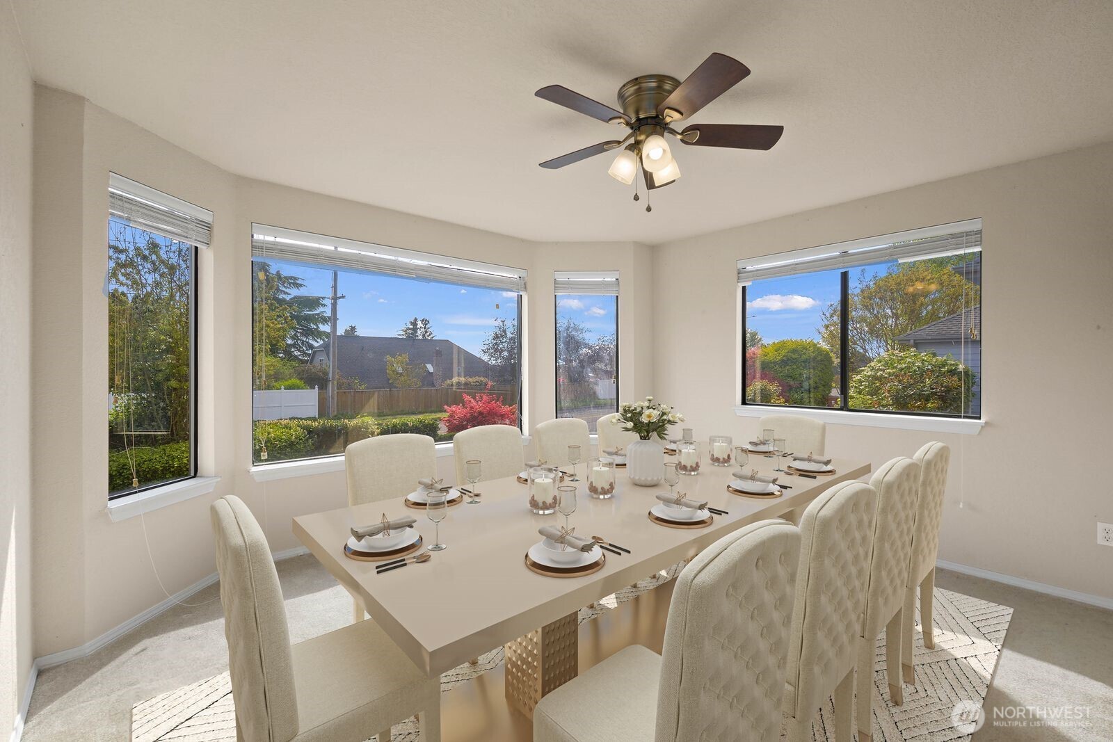 Virtually staged to define the dining space and show how it comfortably accommodates a full table for gatherings and everyday meals.
