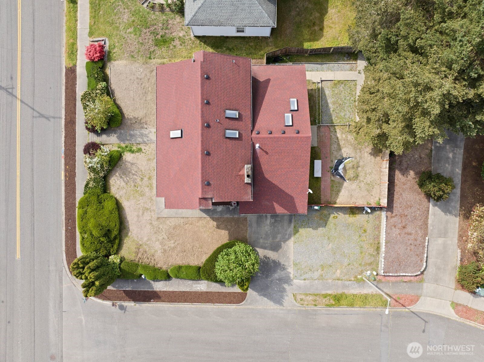 Aerial view highlighting the full footprint of the home, lot layout, and usable outdoor space, giving buyers a clear sense of how everything is positioned.