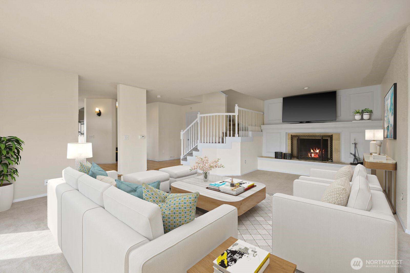 Virtually staged to highlight how this space naturally centers around the fireplace, creating a comfortable layout for both everyday living and hosting.