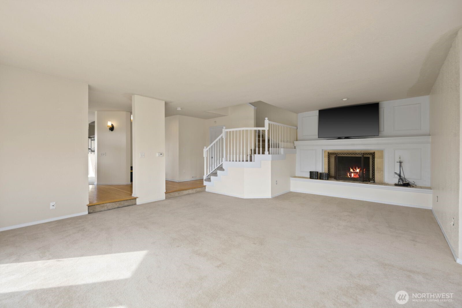 Spacious main living area with an open layout and easy connection to nearby spaces