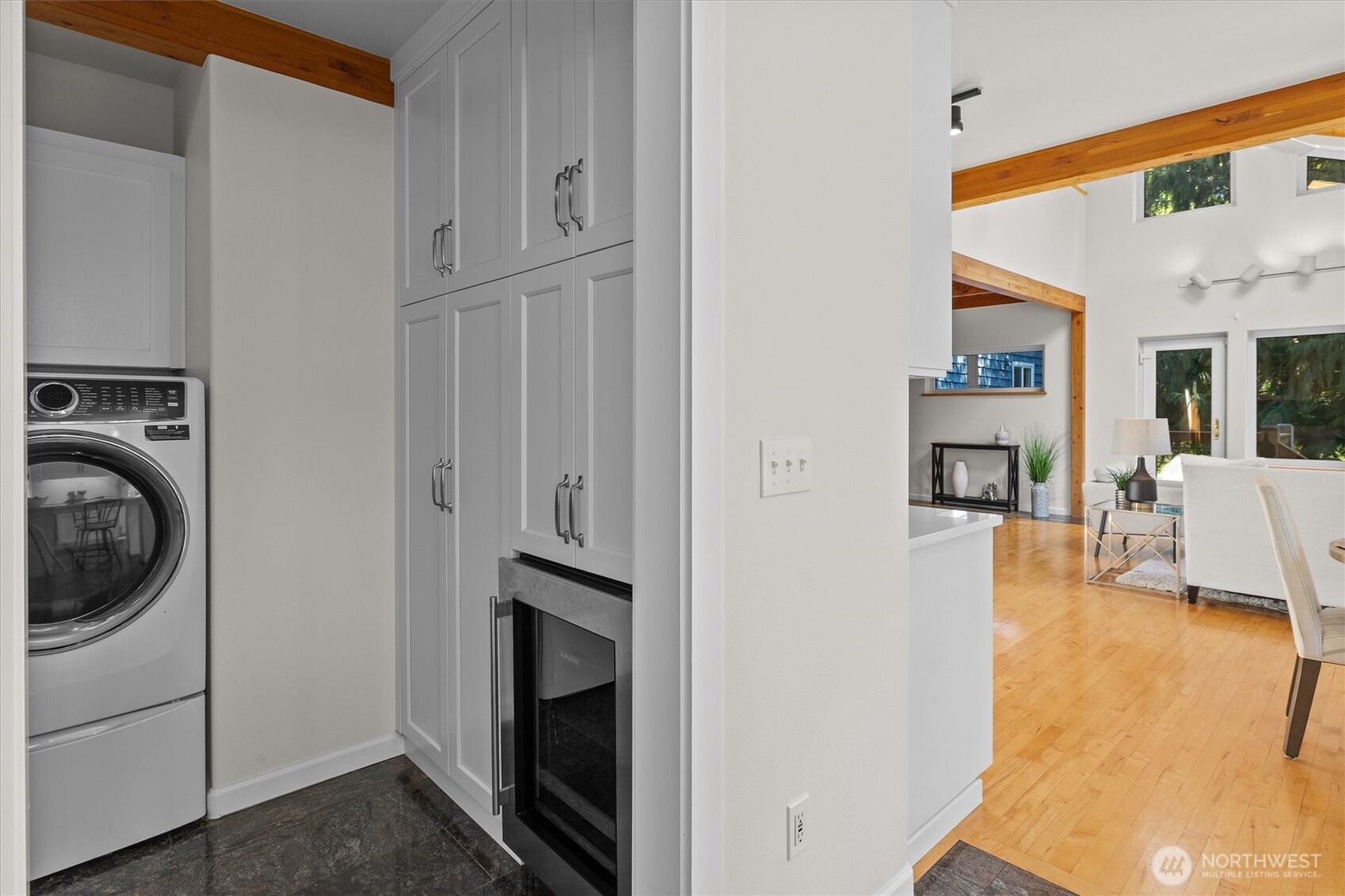 More built-ins surround the wine fridge.  W/D and kitchen appliances can all stay with the home.