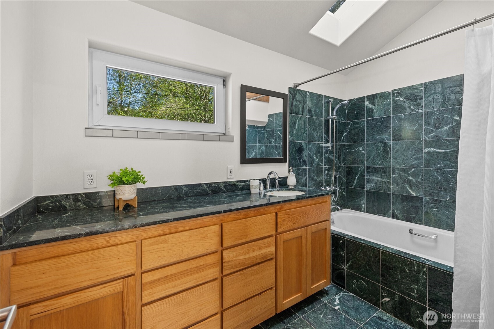 This is the hall bath near the main-floor bedroom.