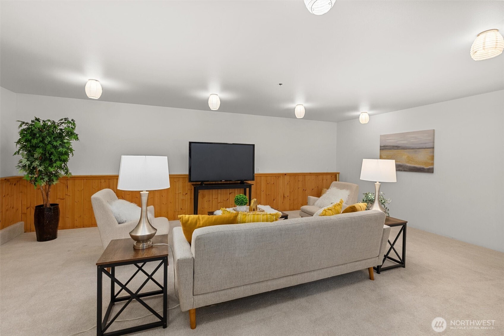 Basement has this large bonus room, an office, separate storage room, and a large workshop area.
