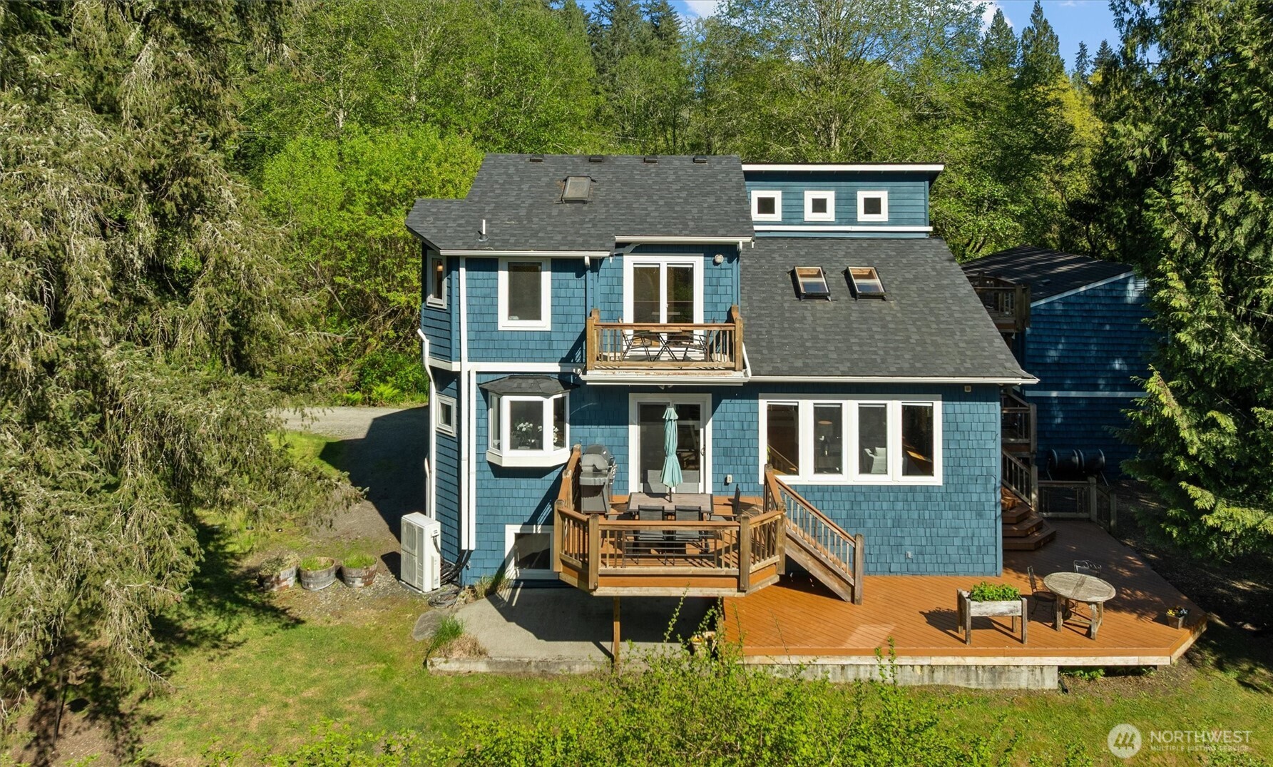 Numerous outside entertaining or relaxing areas.  Just in time for summer!