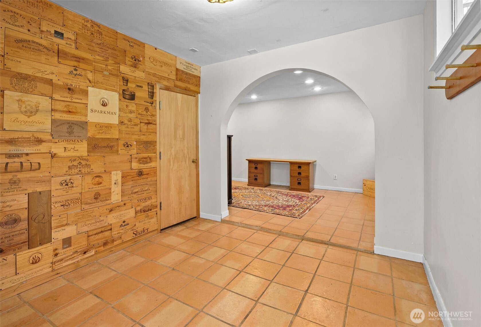 This is the main floor of the ADU.  Wine cellar through the door on the left.
