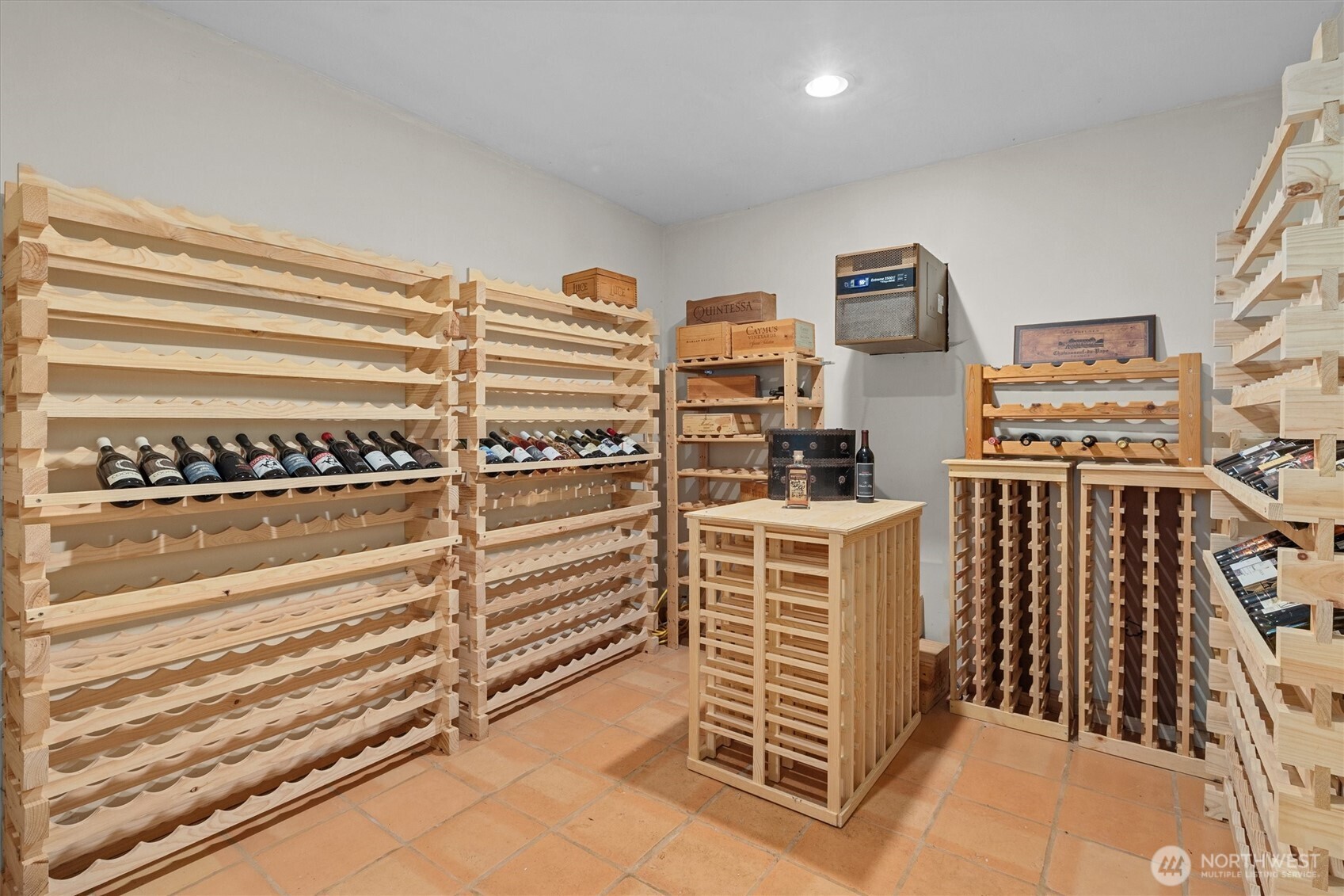 Temperature controlled wine cellar with all the racks you need.  Perhaps we can leave a few bottles to get your collection started!