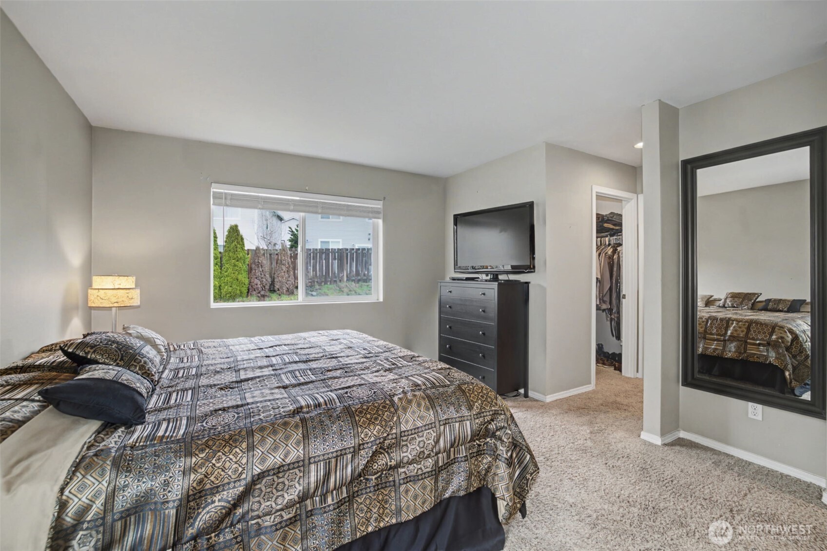 Large primary with walk in-closet. 17'x14'