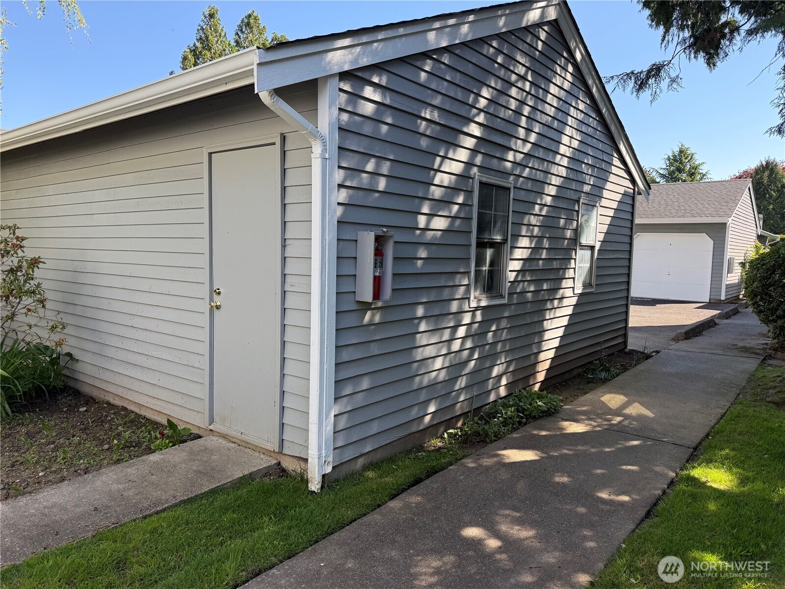 1 car detached garage located in front of unit