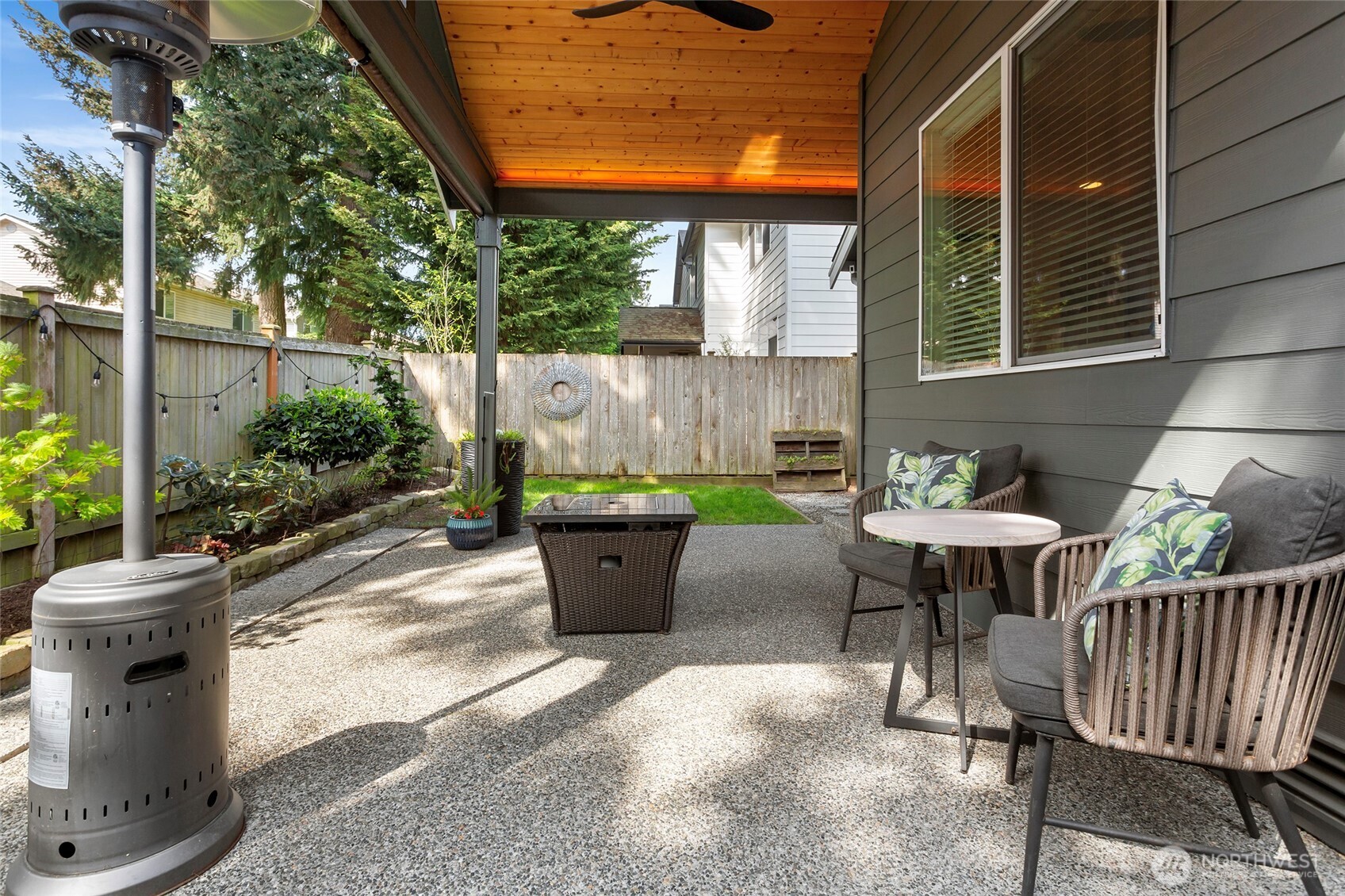 Well-positioned covered patio just off the main living area, providing a sheltered outdoor retreat. Designed for convenience and comfort, this space enhances everyday living and entertaining.