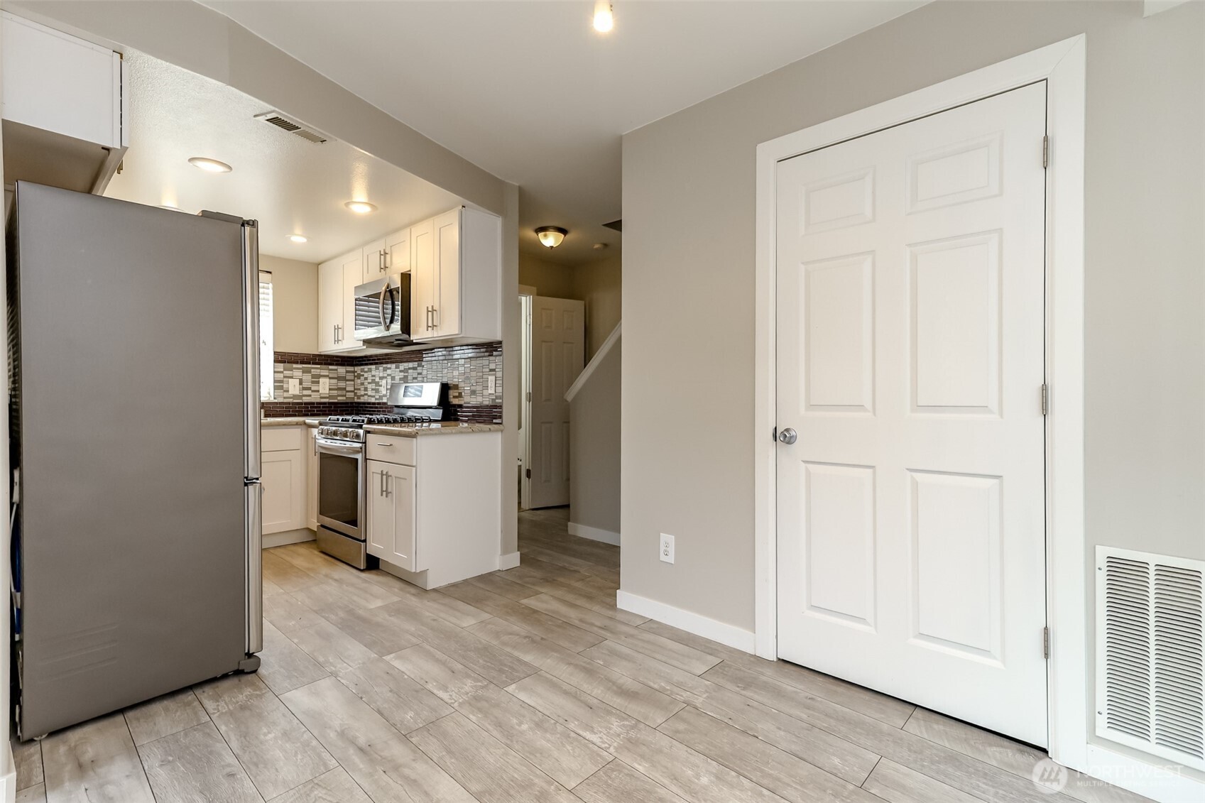 Kitchen has stainless appliances